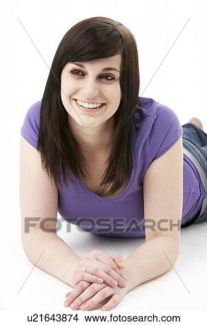 Picture - Young Woman Laying On Stomach. Fotosearch