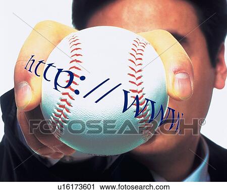 Businessman holding and raising a baseball with web site address, High Angle View, Close Up View Large Photo Image Stock Image - Businessman holding and raising a baseball with web site address, High Angle View, Close Up. Fotosearch