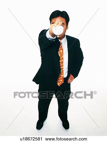 Businessman holding and raising a baseball, High Angle View View Large Photo Image Stock Image - Businessman holding and raising a baseball, High Angle View. Fotosearch
