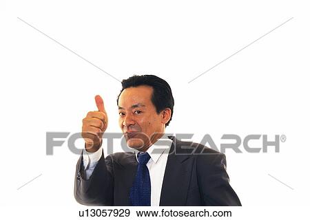 Stock Photo - Businessman putting thumb up in the air with smile, Front View. Fotosearch