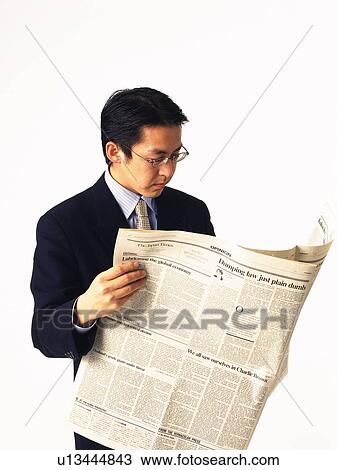 Businessman reading news paper, Side View View Large Photo Image Stock Image - Businessman reading news paper, Side View. Fotosearch