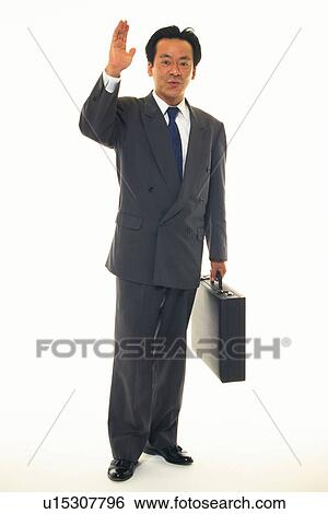 Businessman waving hand, Front View View Large Photo Image Stock Photograph - Businessman waving hand, Front View. Fotosearch