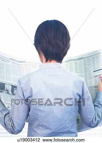 Businesswoman reading news paper, Rear View, High Key View Large Photo Image Stock Image - Businesswoman reading news paper, Rear View, High Key. Fotosearch