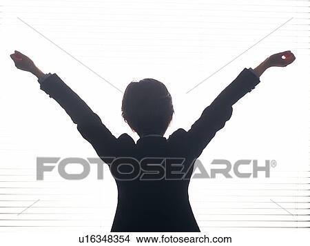 Picture - Businesswoman stretching out arms, Rear View, High Key. Fotosearch
