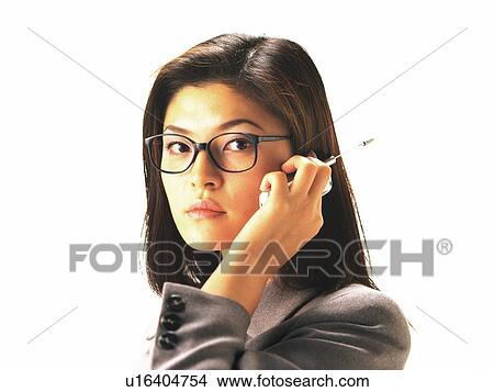 Businesswoman with glasses using mobile phone, Side View View Large Photo Image Picture - Businesswoman with glasses using mobile phone, Side View. Fotosearch
