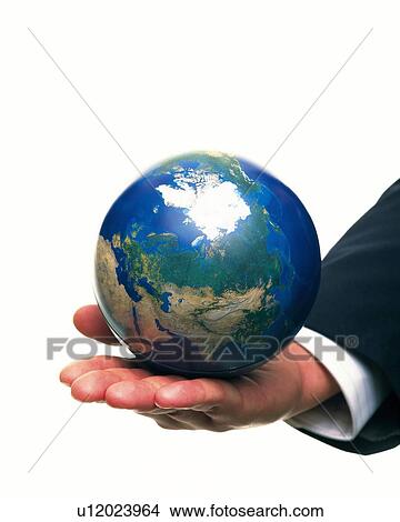 Close up shot of hand holding globe, Front View View Large Photo Image Picture - Close up shot of hand holding globe, Front View. Fotosearch