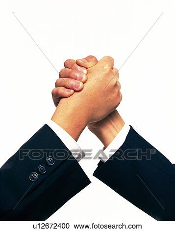 Stock Image - Hands, Shaking hands, Side View. Fotosearch