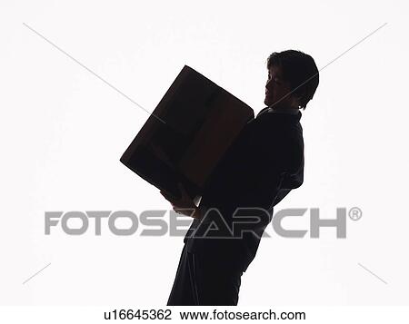 Bsinessman carrying a cardboard box, Side View, Silhouette View Large Photo Image Stock Image - Bsinessman carrying a cardboard box, Side View, Silhouette . Fotosearch