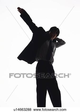 Bsinessman putting jacket on, Side View, Silhouette View Large Photo Image Stock Photo - Bsinessman putting jacket on, Side View, Silhouette . Fotosearch