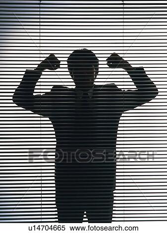 Stock Photography - Bsinessman standing by the blind with victory pose, Front View, Silhouette . Fotosearch