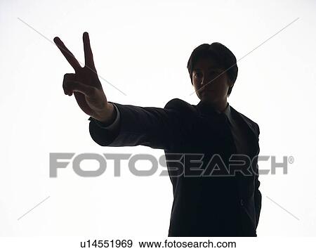 Bsinessman standing with V sign up in the air, Front View, Silhouette View Large Photo Image Stock Photo - Bsinessman standing with V sign up in the air, Front View, Silhouette . Fotosearch