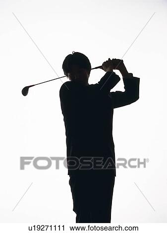 Stock Image - Bsinessman swinging a golf club, Front View, Silhouette . Fotosearch