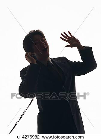 Bsinessman talking on the phone and laughing, Front View, Silhouette View Large Photo Image Stock Image - Bsinessman talking on the phone and laughing, Front View, Silhouette . Fotosearch