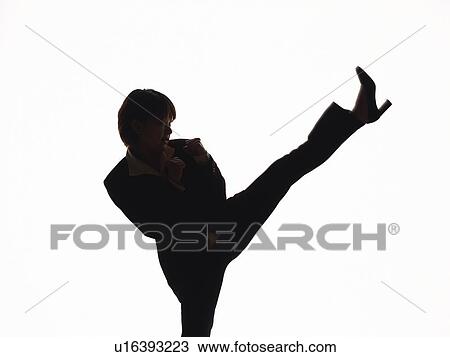 Bsinesswoman kicking up in the air, Side View, Silhouette View Large Photo Image Stock Image - Bsinesswoman kicking up in the air, Side View, Silhouette . Fotosearch