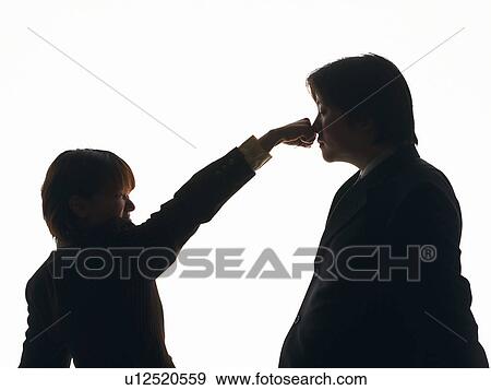Stock Photo - Bsinesswoman punching businessman, Side View, Silhouette . Fotosearch