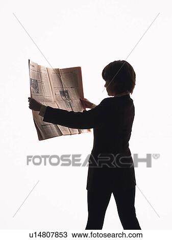 Bsinesswoman standing and reading news paper, Rear View, Silhouette View Large Photo Image Stock Image - Bsinesswoman standing and reading news paper, Rear View, Silhouette . Fotosearch