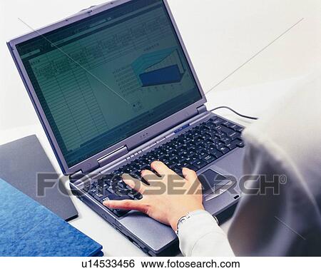 Hand typing keyboard at the desk, Portrait, High Angle View View Large Photo Image Stock Photograph - Hand typing keyboard at the desk, Portrait, High Angle View. Fotosearch