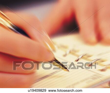 Hand writing down on a scheduler, Close Up, Blurred Motion View Large Photo Image Stock Photo - Hand writing down on a scheduler, Close Up, Blurred Motion. Fotosearch