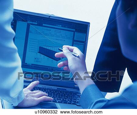 Three people working together with a computer at the desk, Portrait, Rear View, Toned Image View Large Photo Image Stock Image - Three people working together with a computer at the desk, Portrait, Rear View, Toned Image. Fotosearch