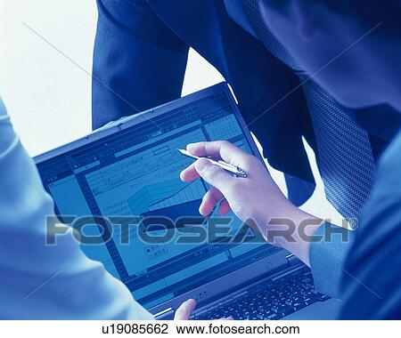 Three people working together with a computer at the desk, Portrait, Rear View, Toned Image View Large Photo Image Stock Image - Three people working together with a computer at the desk, Portrait, Rear View, Toned Image. Fotosearch