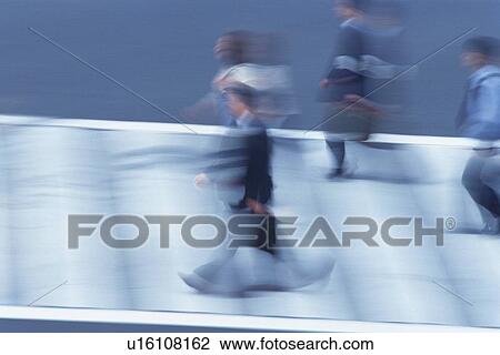 Business people crossing at the crosswalk, high angle view, blurred motion, Tokyo, Japan View Large Photo Image Stock Image - Business people crossing at the crosswalk, high angle view, blurred motion, Tokyo, Japan. Fotosearch