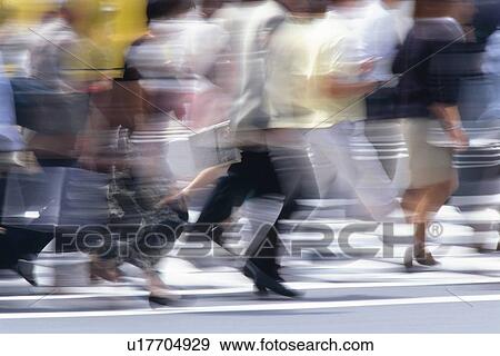 People running at the crosswalk, side view, Tokyo, Japan View Large Photo Image Stock Photo - People running at the crosswalk, side view, Tokyo, Japan. Fotosearch