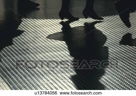 People walking on metal floor, high angle view, New York City, NY, USA View Large Photo Image Stock Photograph - People walking on metal floor, high angle view, New York City, NY, USA. Fotosearch