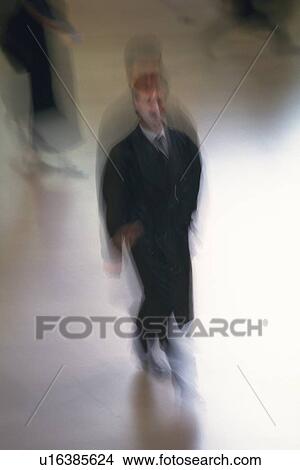 Walking businessman, high angle view, blurred motion, New York City, NY, USA View Large Photo Image Picture - Walking businessman, high angle view, blurred motion, New York City, NY, USA. Fotosearch