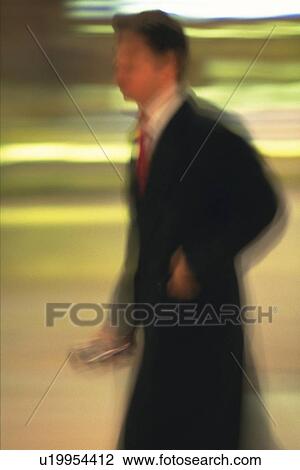 Walking businessman, side view, blurred motion, New York City, NY, USA View Large Photo Image Stock Image - Walking businessman, side view, blurred motion, New York City, NY, USA. Fotosearch