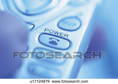 Stock Photo - Businessman holding a mobile phone, high angle view, close up. Fotosearch