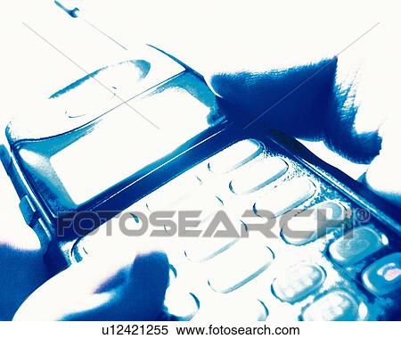 Businessman holding a mobile phone, close up, high key View Large Photo Image Stock Photography - Businessman holding a mobile phone, close up, high key. Fotosearch