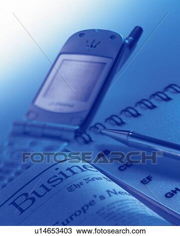 Mobile phone and newspaper with stationery, high angle view, close up, toned image View Large Photo Image Stock Image - Mobile phone and newspaper with stationery, high angle view, close up, toned image. Fotosearch