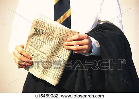 Businessman holding news paper, Front View View Large Photo Image Stock Image - Businessman holding news paper, Front View. Fotosearch