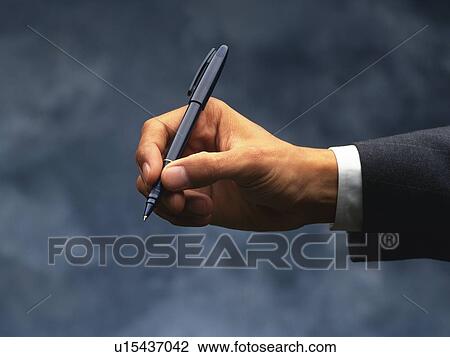Hand holding a pen, Side View View Large Photo Image Stock Image - Hand holding a pen, Side View. Fotosearch