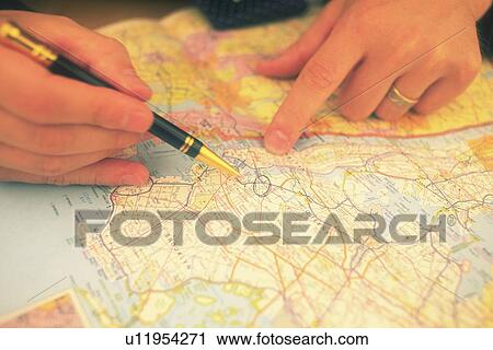 Hand marking on a map, High Angle View View Large Photo Image Stock Image - Hand marking on a map, High Angle View. Fotosearch