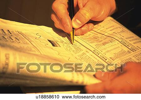 Hands holding news paper, High Angle View View Large Photo Image Stock Image - Hands holding news paper, High Angle View. Fotosearch