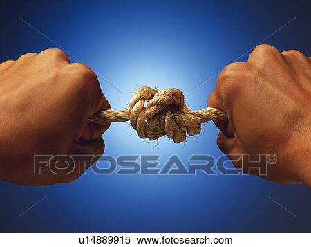 Hands tying a rope, Close Up View Large Photo Image Stock Photography - Hands tying a rope, Close Up. Fotosearch