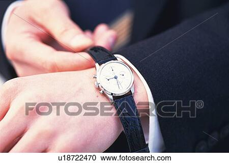 Hands wearing a watch, Close Up, High Angle View View Large Photo Image Stock Image - Hands wearing a watch, Close Up, High Angle View. Fotosearch