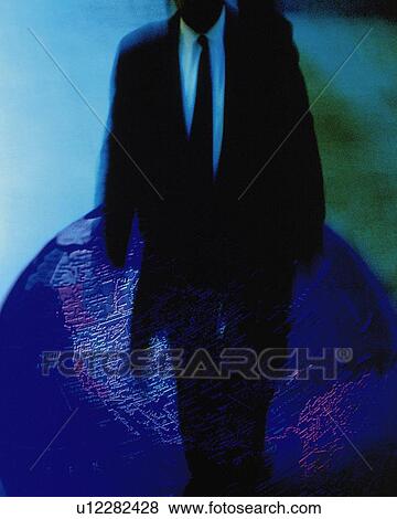 Stock Photo - Businessman and globe, CG, composition, blurred motion, front view. Fotosearch