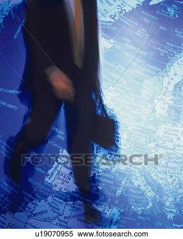 Stock Photography - Businessman and globe, CG, composition, blurred motion. Fotosearch