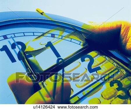 Businessman holding mobile phone with image of clock, CG, composition, close up View Large Photo Image Picture - Businessman holding mobile phone with image of clock, CG, composition, close up. Fotosearch