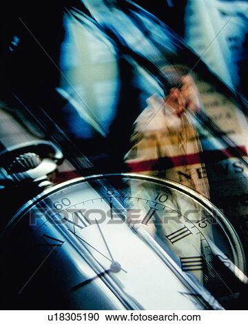 Businessman riding escalators, with image of clock on newspaper, CG, composition, blurred motion View Large Photo Image Stock Image - Businessman riding escalators, with image of clock on newspaper, CG, composition, blurred motion. Fotosearch