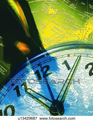 Businessman with image of clock and globe, CG, composition, blurred motion View Large Photo Image Stock Photo - Businessman with image of clock and globe, CG, composition, blurred motion. Fotosearch