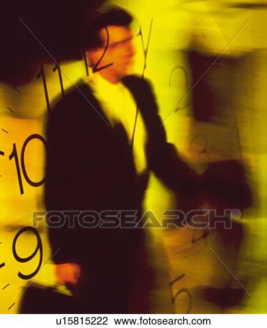 Businessman with image of clock, CG, composition, blurred motion View Large Photo Image Stock Image - Businessman with image of clock, CG, composition, blurred motion. Fotosearch