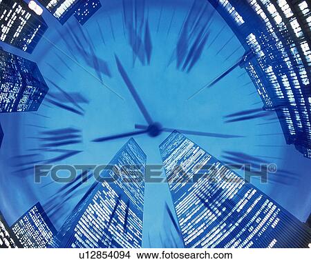 Clock and high-rise buildings in New York City, NY, USA, CG, composition, blurred motion, low angle view View Large Photo Image Picture - Clock and high-rise buildings in New York City, NY, USA, CG, composition, blurred motion, low angle view. Fotosearch