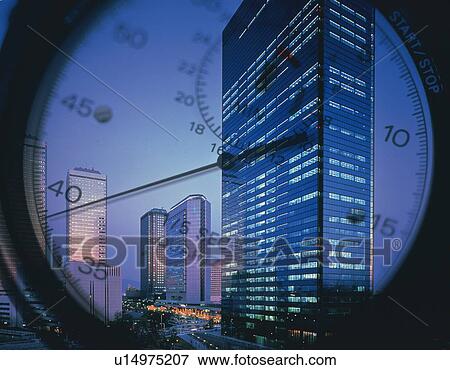 Stock Photo - Clock and high-rise buildings in the evening, CG, composition. Fotosearch