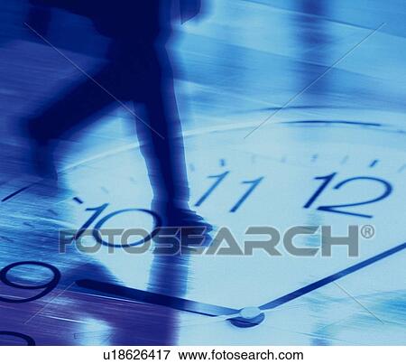 Running businessman with image of clock, CG, composition, blurred motion View Large Photo Image Stock Photo - Running businessman with image of clock, CG, composition, blurred motion. Fotosearch