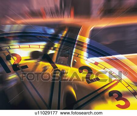 Stock Photo - Taxi in a row and image of clock, New York City, NY, USA, CG, composition, blurred motion. Fotosearch