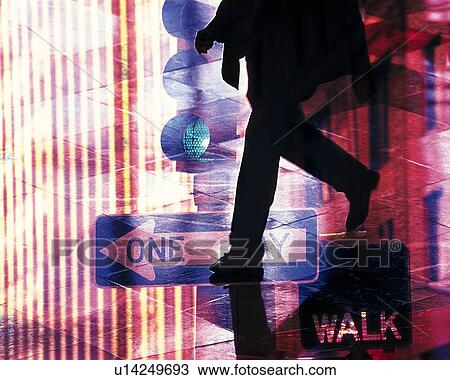 Stock Image - Walking businessman and image of signal, green light, CG, composition. Fotosearch
