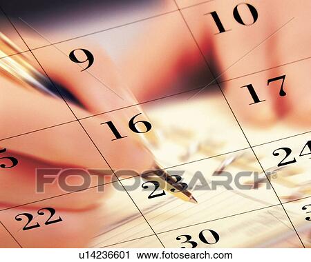 Stock Image - Woman writing down on personal organizer and image of calendar, CG, composition, close up, blurred motion. Fotosearch